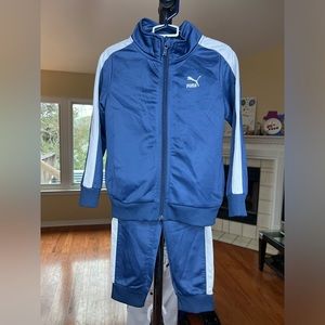 Boys puma matching tracksuit in blue and white.
